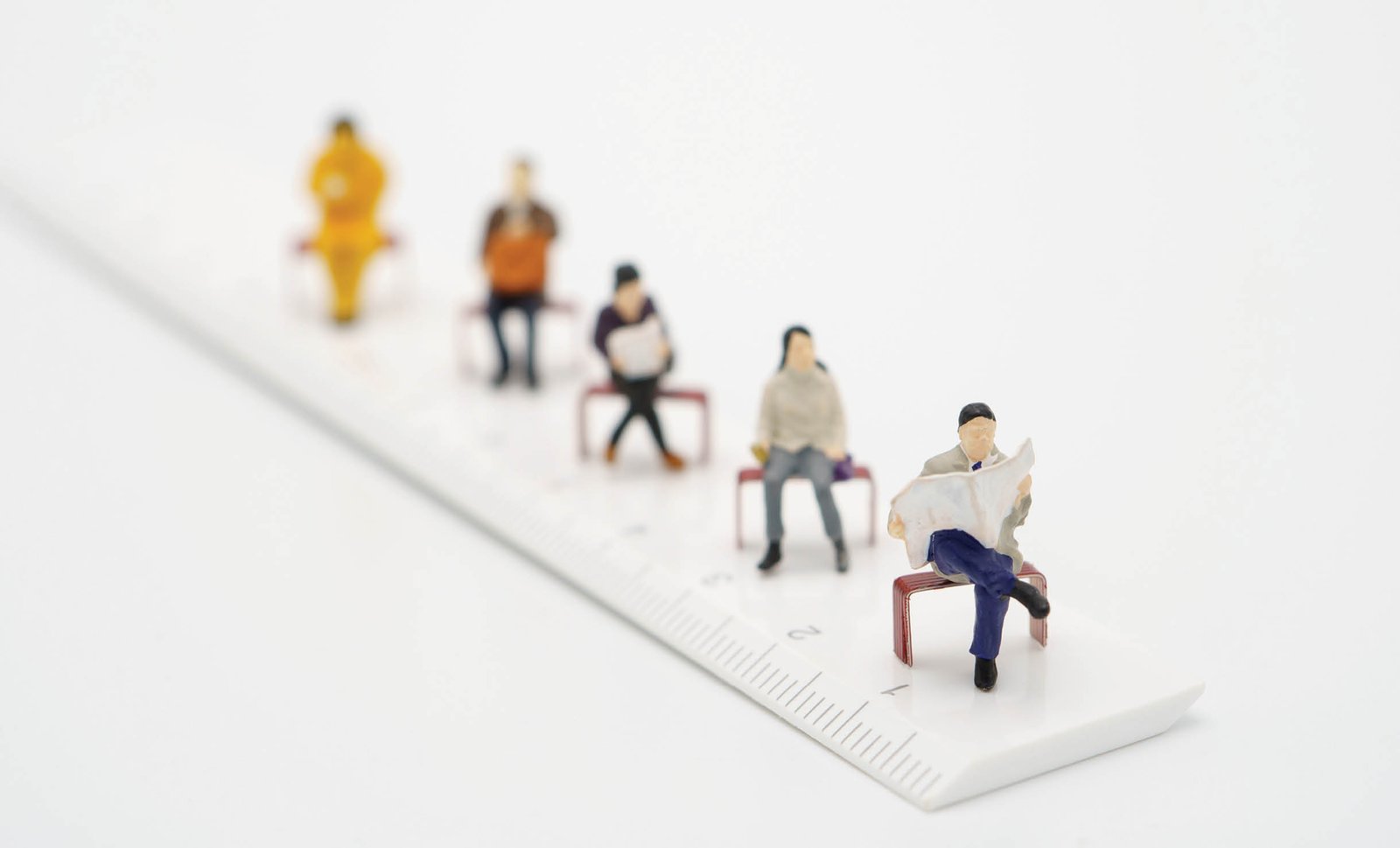 Social distancing  Miniature people stay apart to reduce Covid 19 virus infection  Maintain social distance Detained, could not find anyone  using as background Healthcare concept and keep distance 