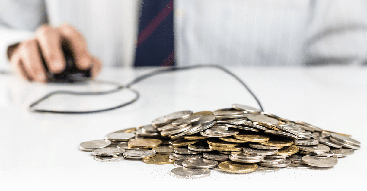 Pile of coins with hand on computer mouse, businessman can manage personal finance directly and promptly