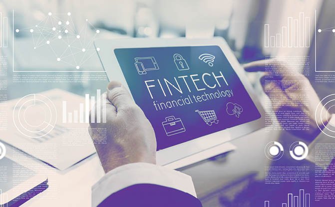 Financial technology fintech concept businessman using digital tablet